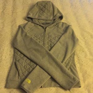 Light gray North Face jacket.